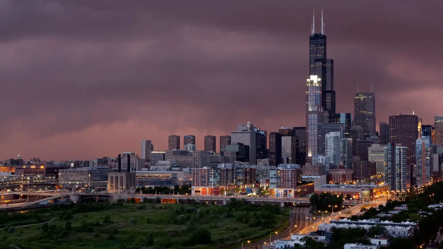 Downtown skyline at dusk, 3D architectural rendering Chicago with glowing towers and stormy sky