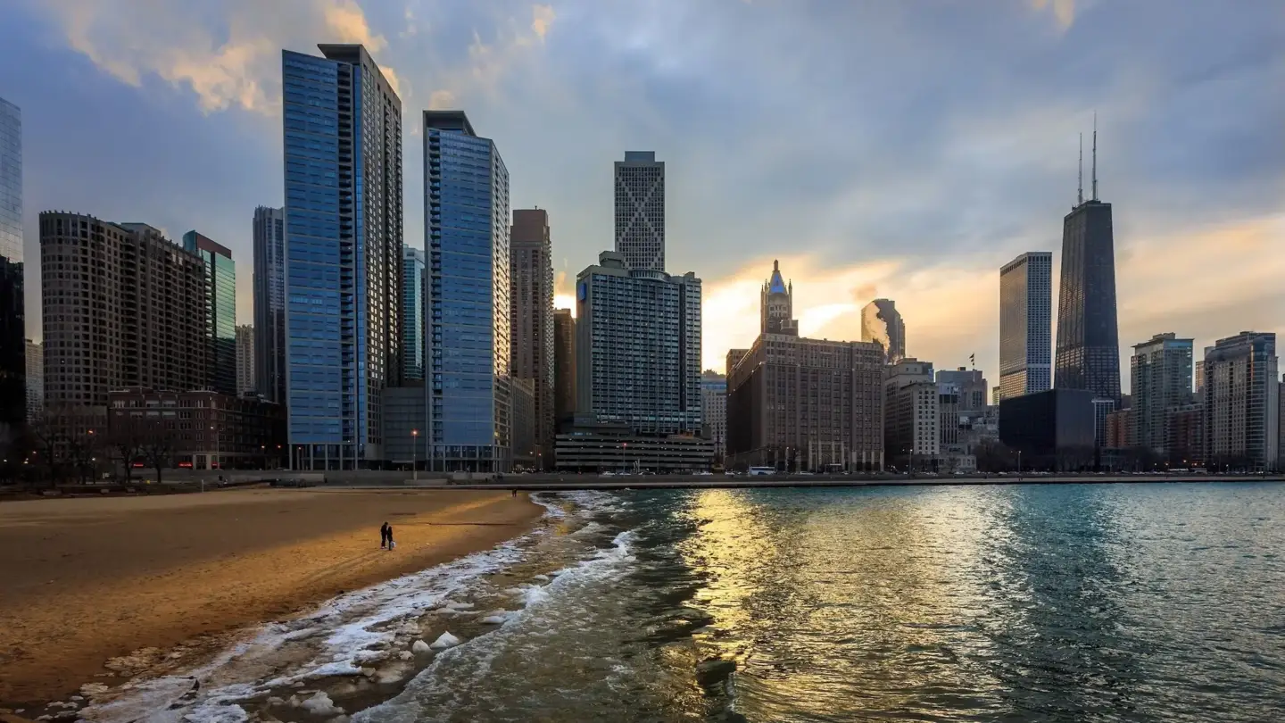 Chicago skyline at lakeshore sunset, 3D rendering Chicago style with beach, water, and tall towers