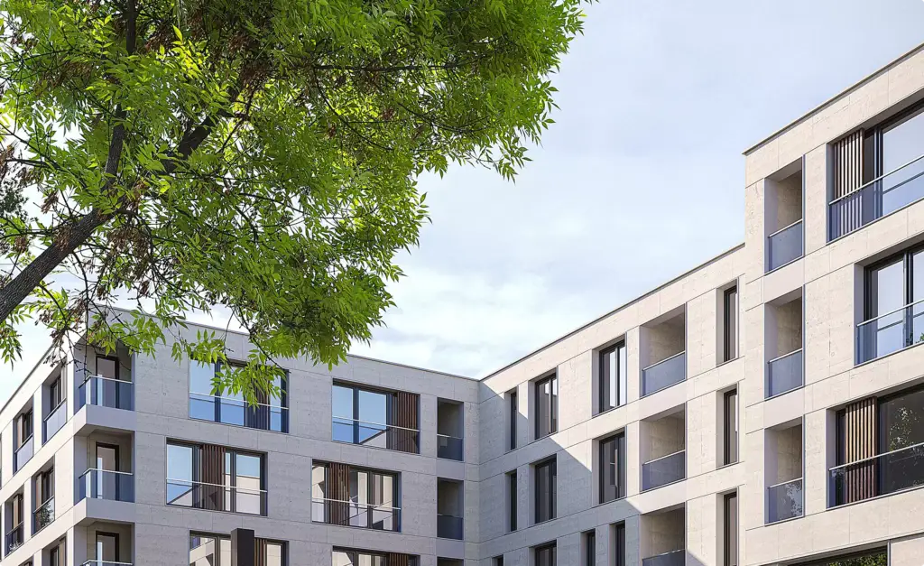 Complejo de apartamentos: edificios residenciales modernos con balcones y grandes ventanales entre árboles