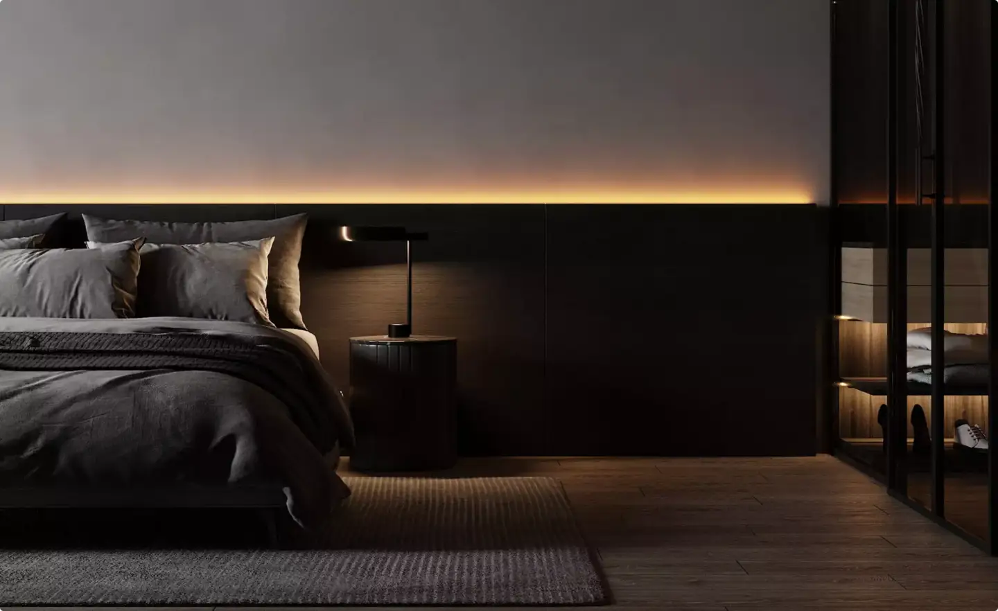 Render of a dark bedroom lit by a warm LED wall light and a glowing glass wardrobe at night