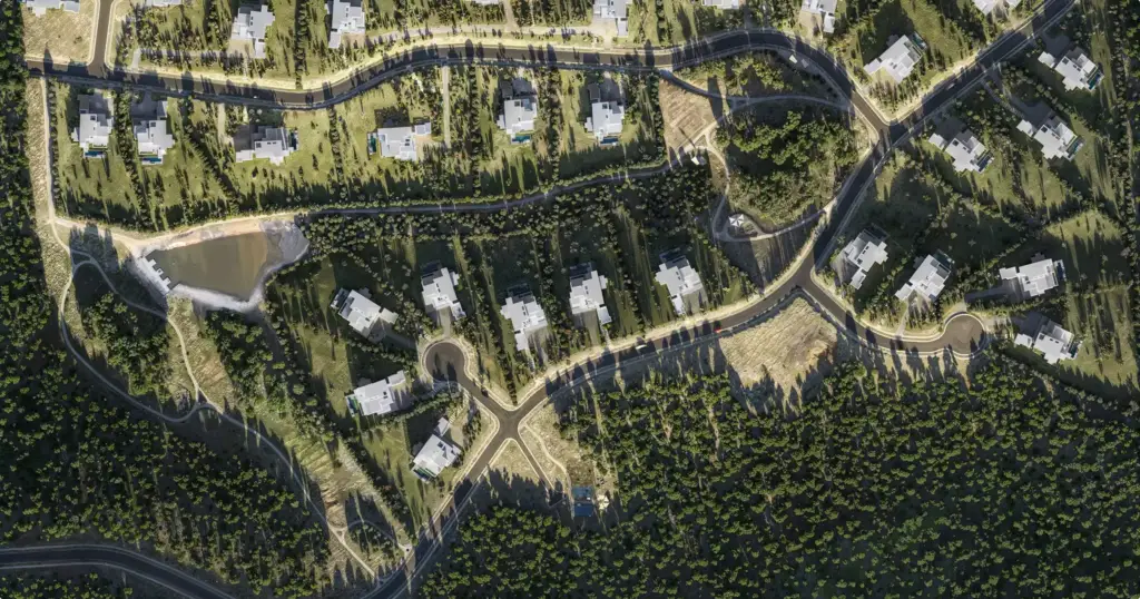 Renders arquitectónicos aéreos del plano de emplazamiento de una urbanización de villas con calles curvas, árboles y casas modernas