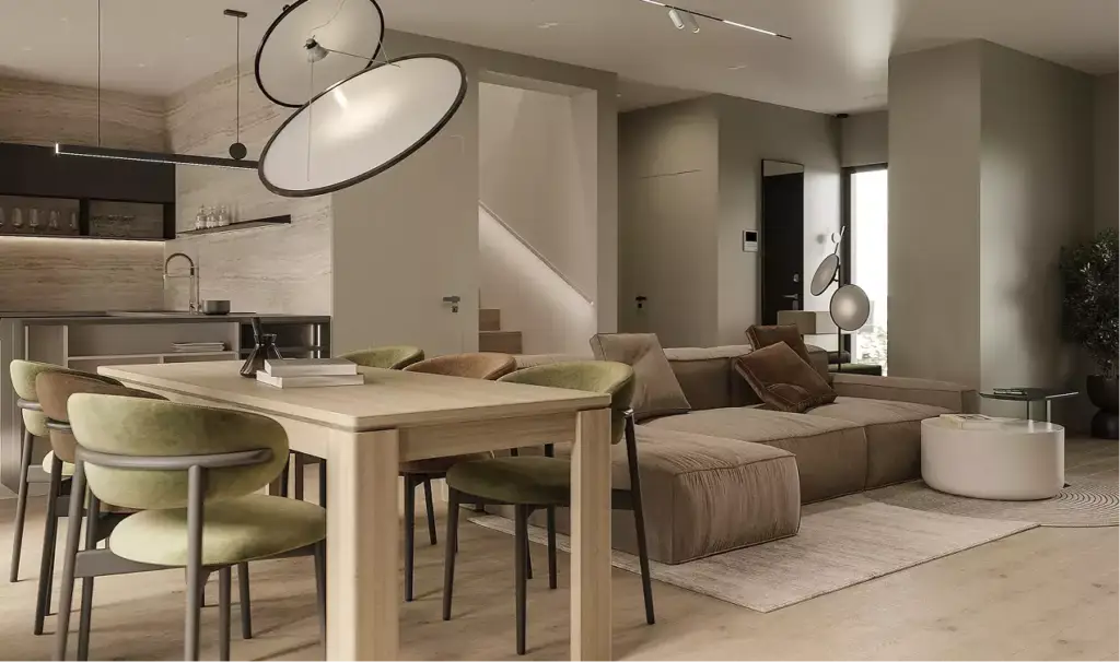 Render de un salón-cocina abierto con mesa de madera, sofá y lámparas colgantes