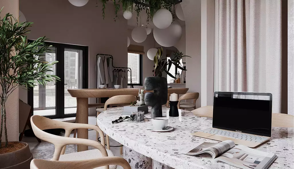 Visualizzazione di una caffetteria dall'interno moderno, con tavolo in terrazzo, sedie in legno, laptop, lampade a sospensione e piante