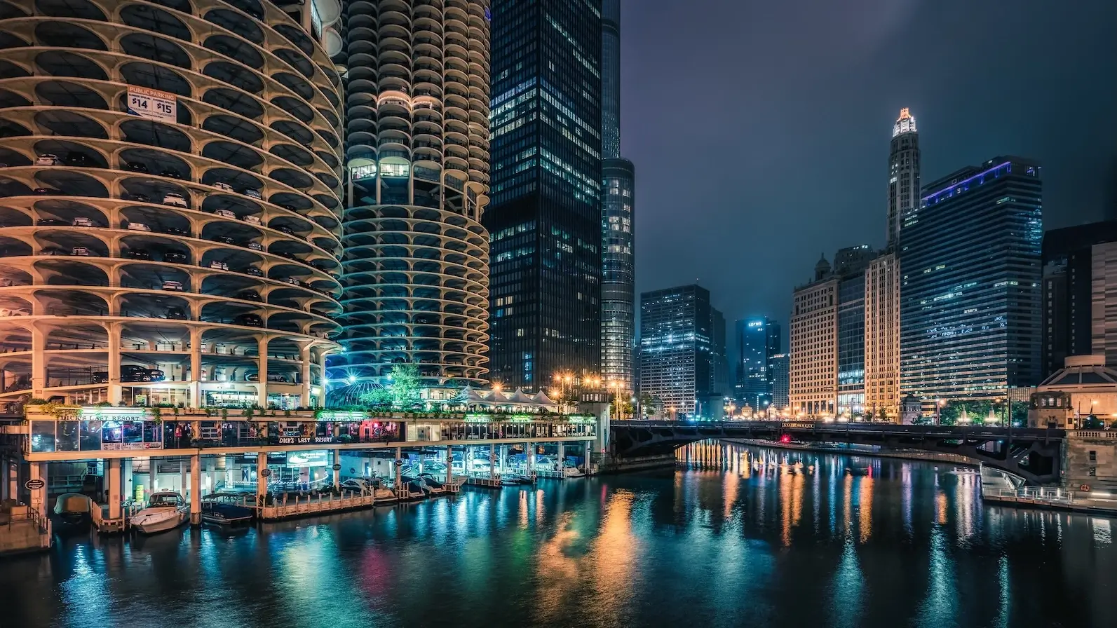 Riverfront towers at night, chicago 3D rendering look with reflections, bridge, and marina buildings