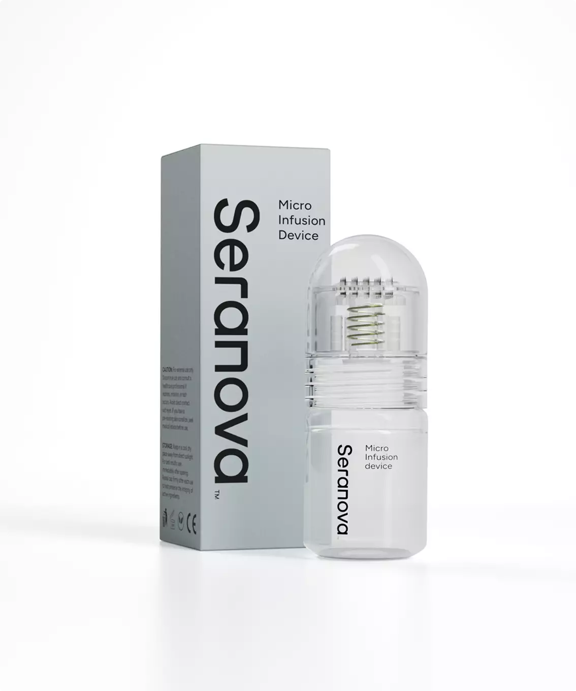 Frasco del dispositivo de microinfusión junto a su caja sobre fondo blanco, render de packaging cosmético
