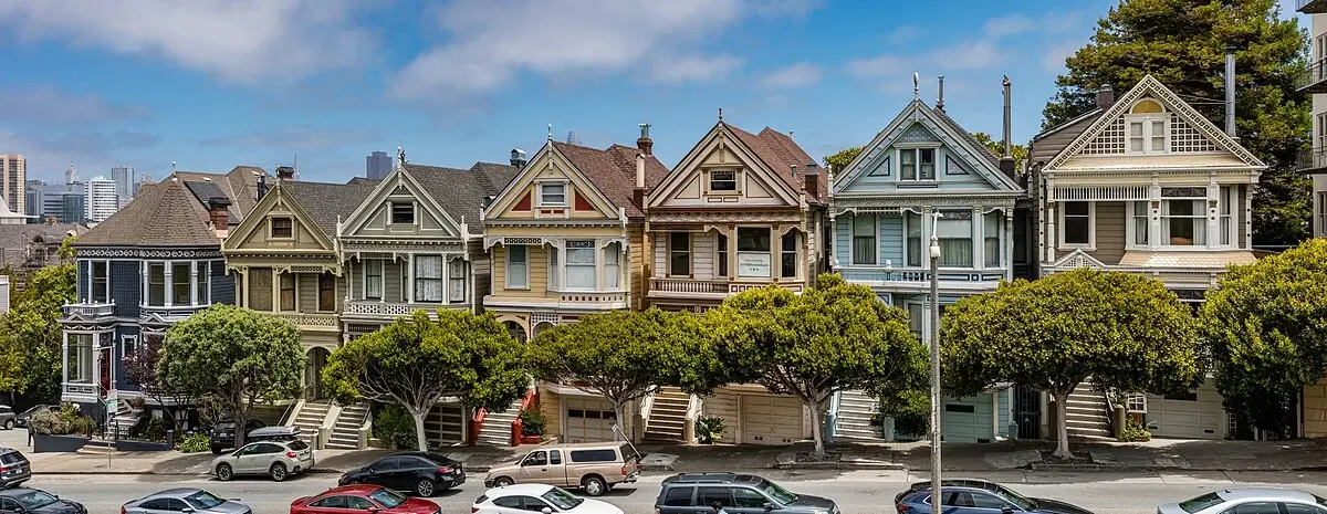 Architectural Styles Through History: 15 Types and How to Identify Them Victorian residential building styles row of colorful houses with ornate facades in San Francisco street