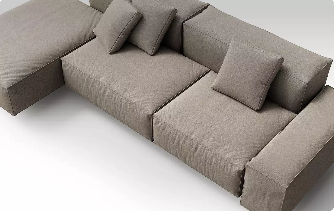 Modulares Stoffsofa mit quadratischen Kissen in neutralem Studio-Setting, 3D-Möbelvisualisierung