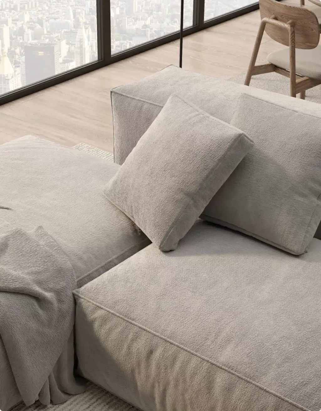Portfolio Möbelvisualisierung: Nahaufnahme beiger Kissen eines Modulsofas
