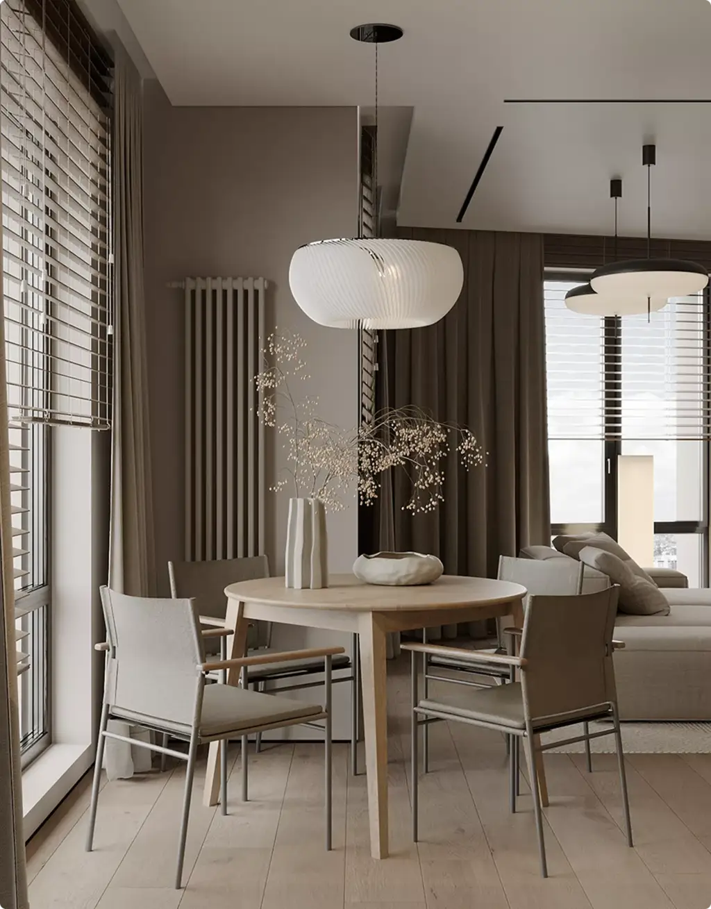 Vastgoedvisualisatie van een moderne eethoek met ronde tafel en hanglampen