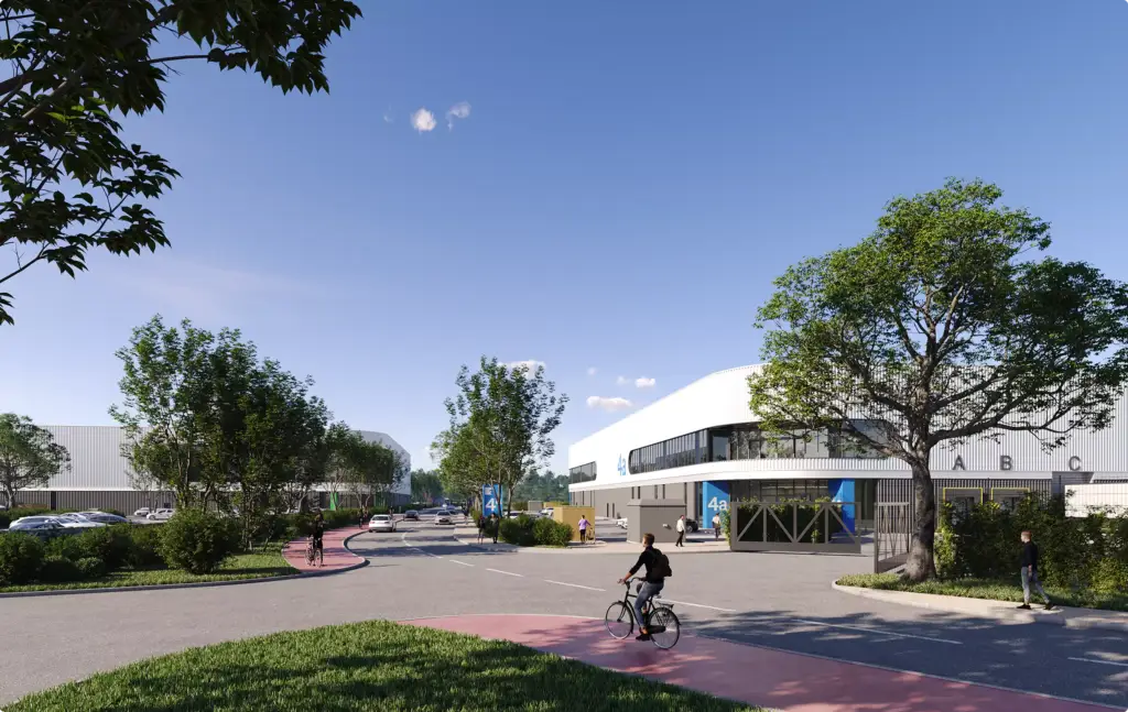 Gewerbeimmobilien-Visualisierung eines modernen Industriecampus mit Radfahrern und Bäumen