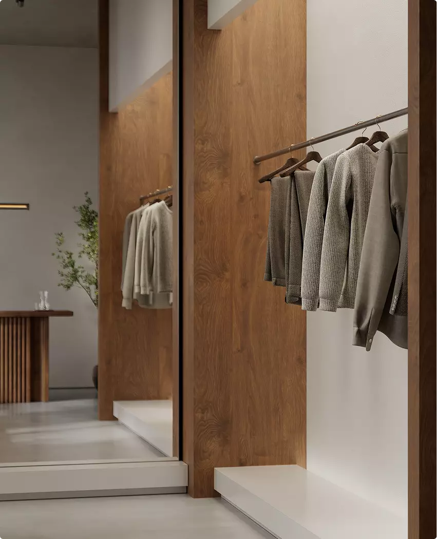 Interieurontwerp van modewinkel met kledingrek, spiegelreflectie en houten wandpanelen