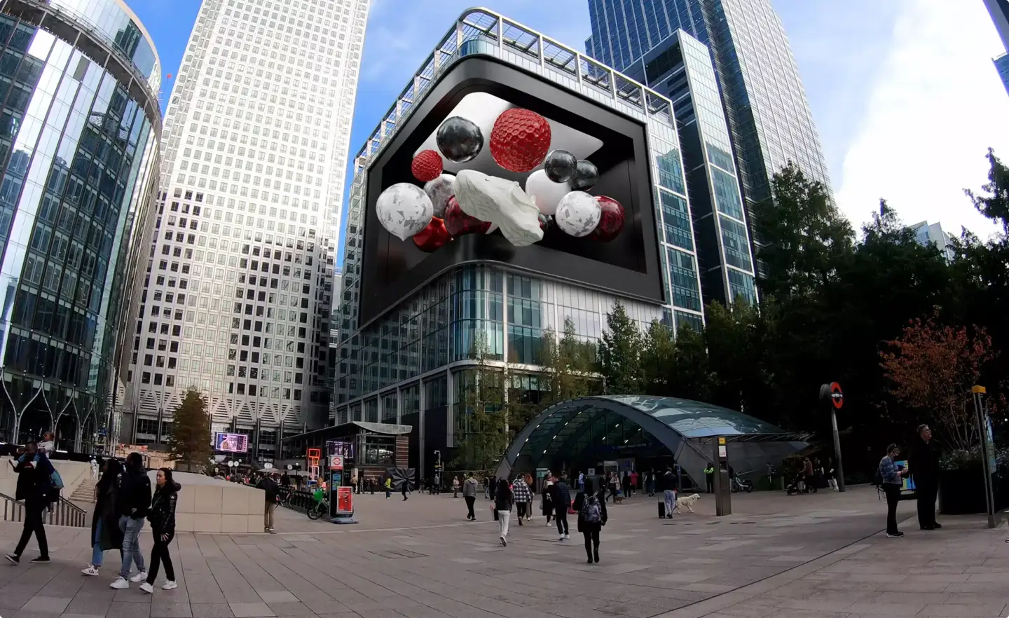 FOOH ad: 3D spheres bursting out of a real billboard on a city street