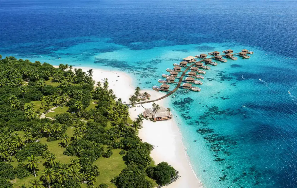 Tropical island resort with overwater bungalows and clear blue ocean, Architectural Rendering Process