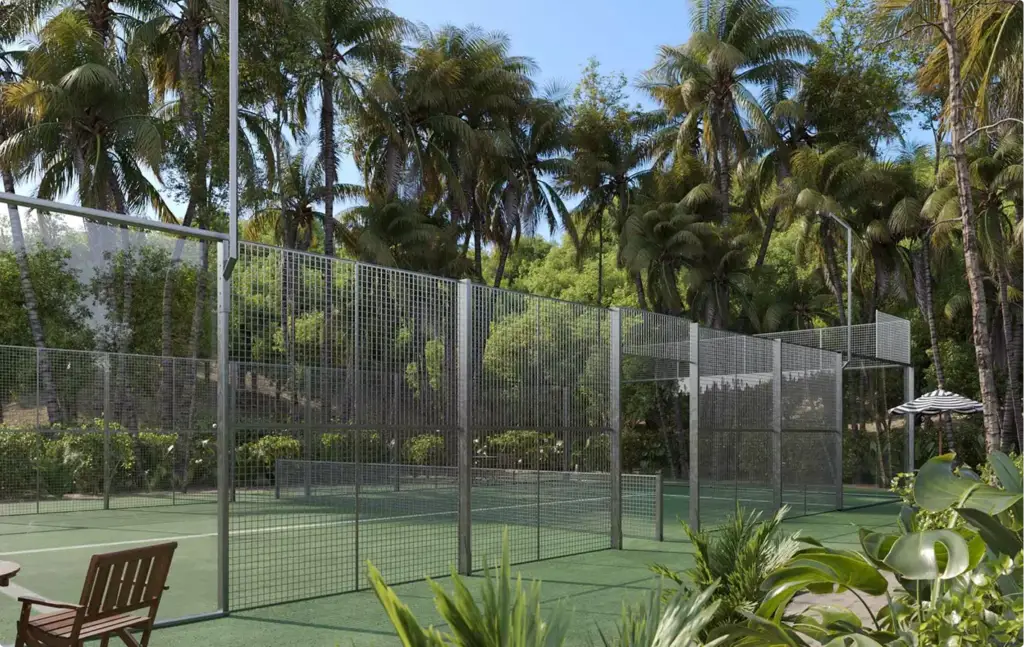 Outdoor tennis court with metal fencing surrounded by tropical trees, Architectural Rendering Process