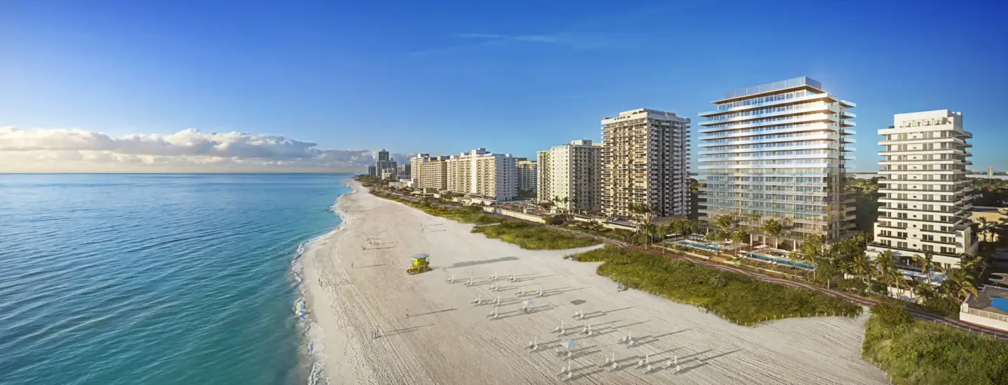 Beachfront residential towers beside an ocean shoreline, property marketing CGI for real estate development launches