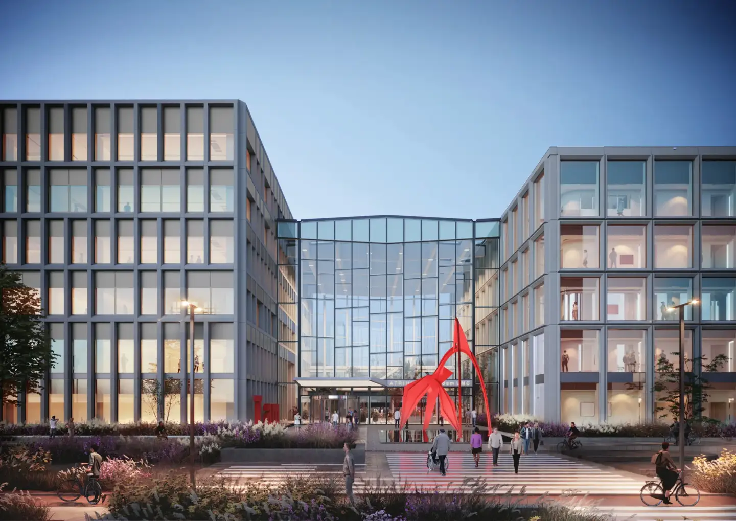 Modern office complex with glass atrium, landscaped plaza, pedestrians, and red sculpture for property developers