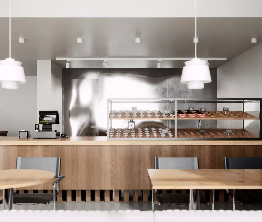 Café-interieur in CGI met gebaksvitrine, houten afwerking en hanglampen
