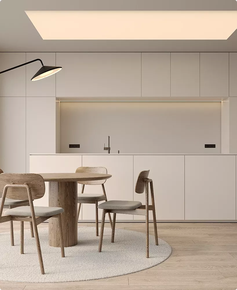 Minimal kitchen hero image with dining table chairs and clean white cabinetry