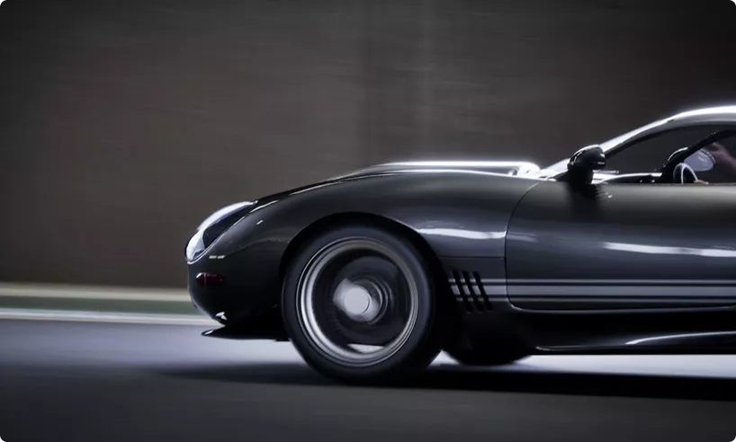 Sports car hero image driving on road with motion blur and sleek black design