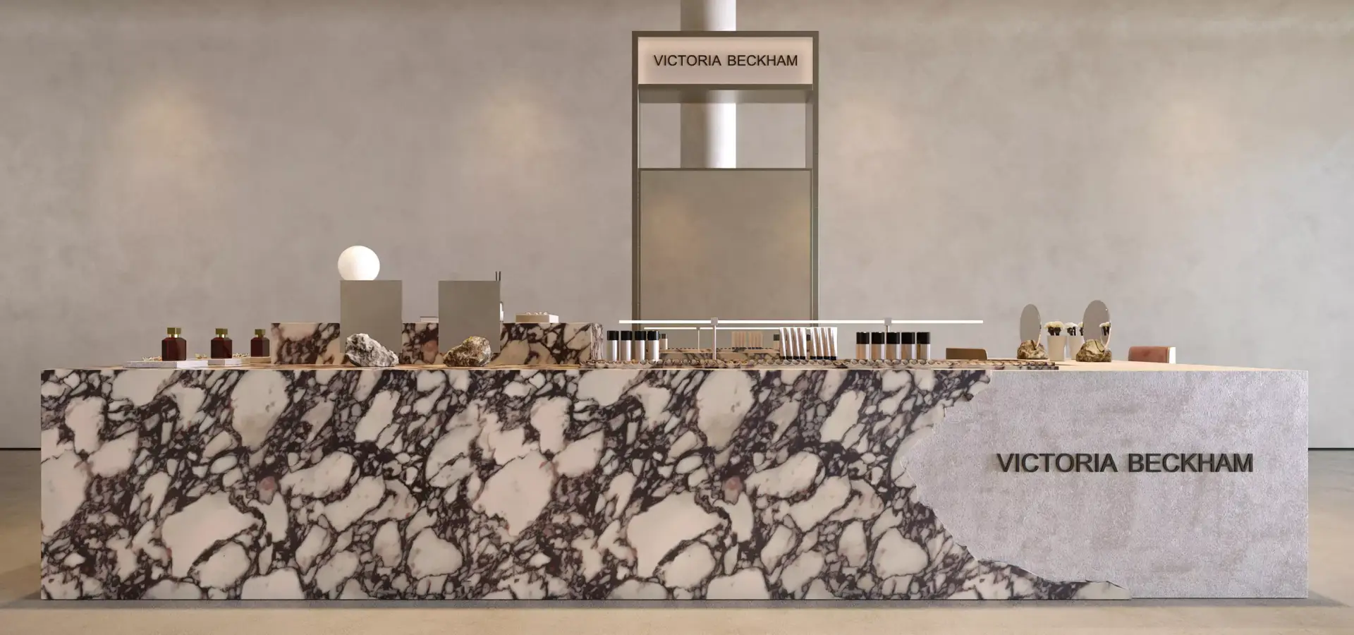 Luxury beauty retail cosmetic display island with elegant marble textures, premium branding, and minimalist merchandising setup.