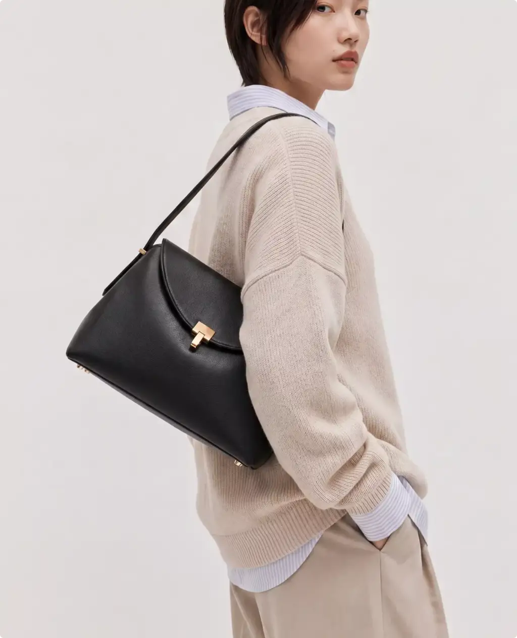 Premium leather Toteme bag CGI visualization worn with cream knit sweater