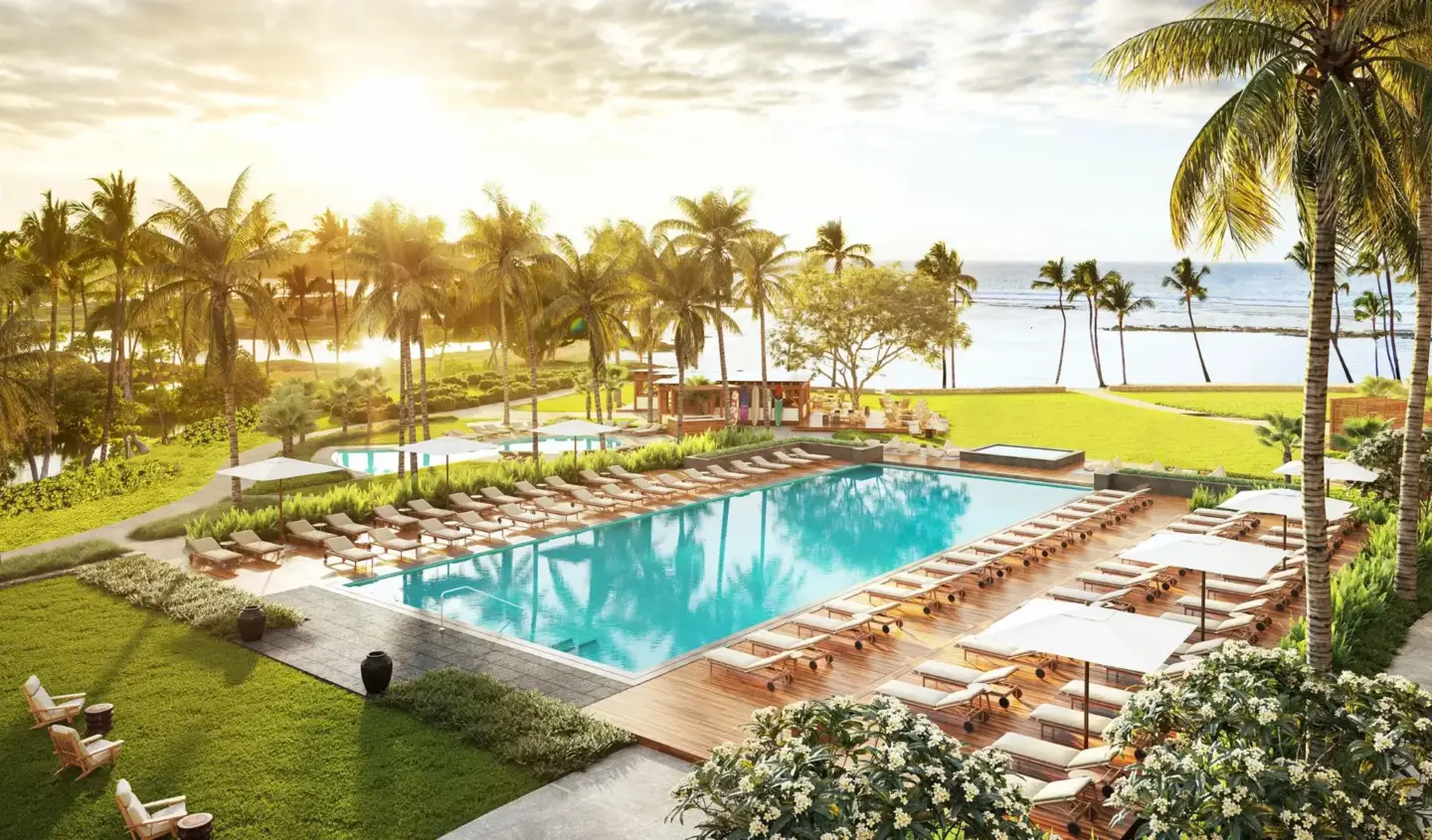 Best 3D Rendering Companies in the USA for Architectural Visualization & Real Estate in 2026 Luxury pool resort with palm trees, 3D rendering company USA, sun loungers and ocean