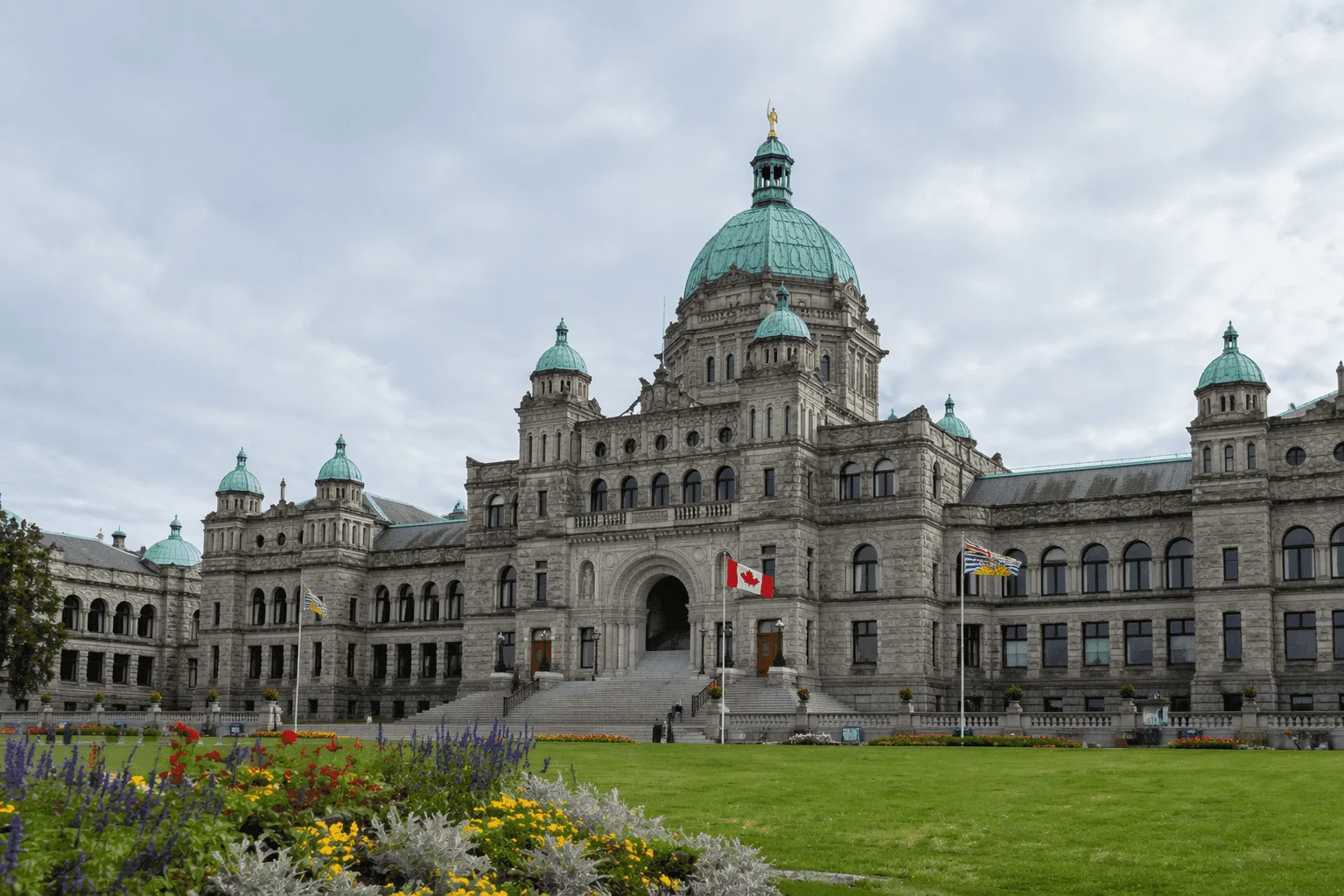 Victorian Architecture: A Complete Guide to Its History and Styles Parliament library building with Gothic spires, stone walls, and riverside setting