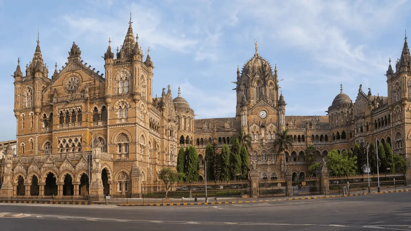 Victorian Architecture: A Complete Guide to Its History and Styles Victorian railway station with ornate domes, arched windows, and symmetrical stone facade