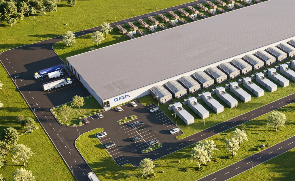 Aerial render of a data center hall entrance with truck access, parking and landscaping