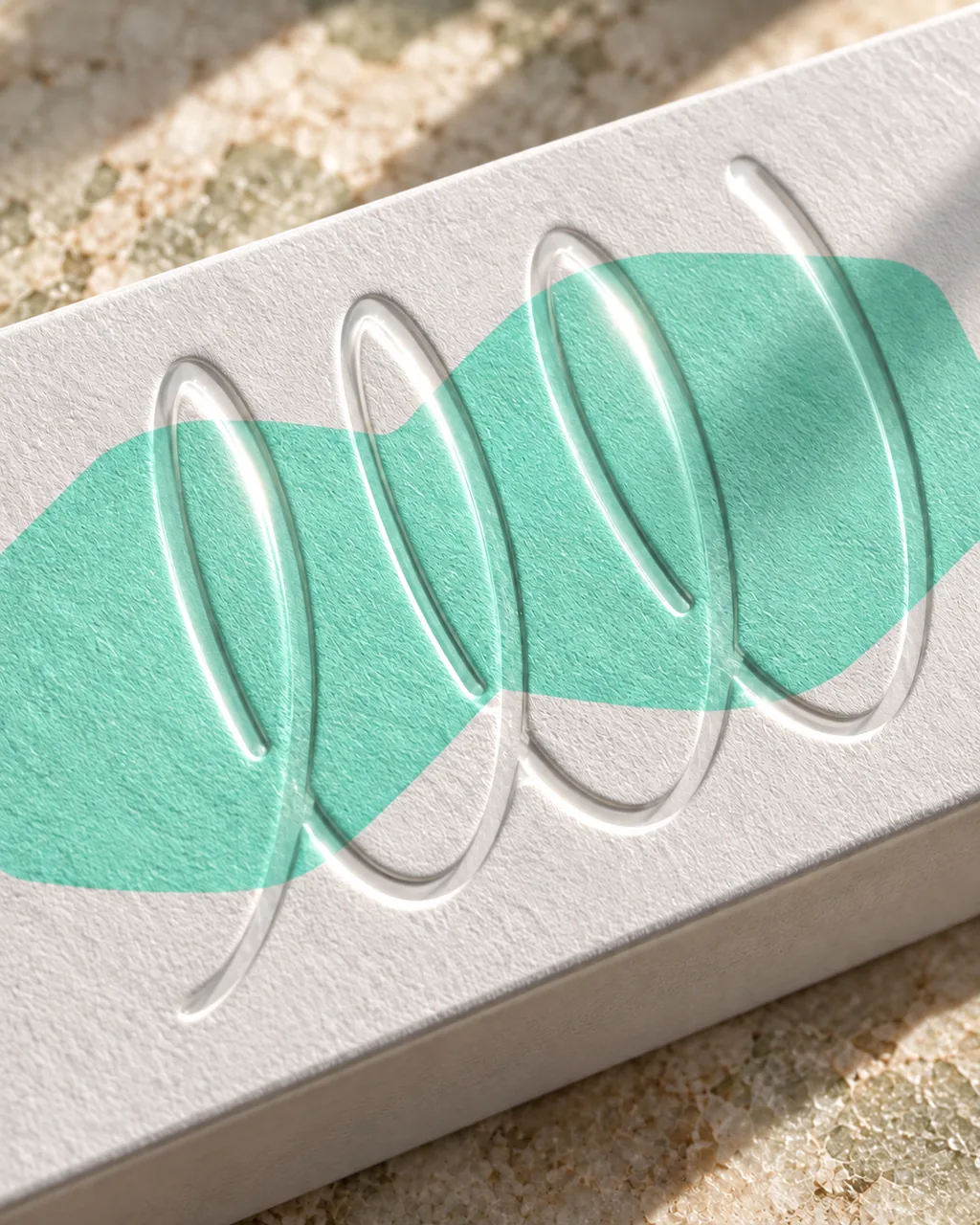 The embossed mint artwork on the Flawless carton, close up