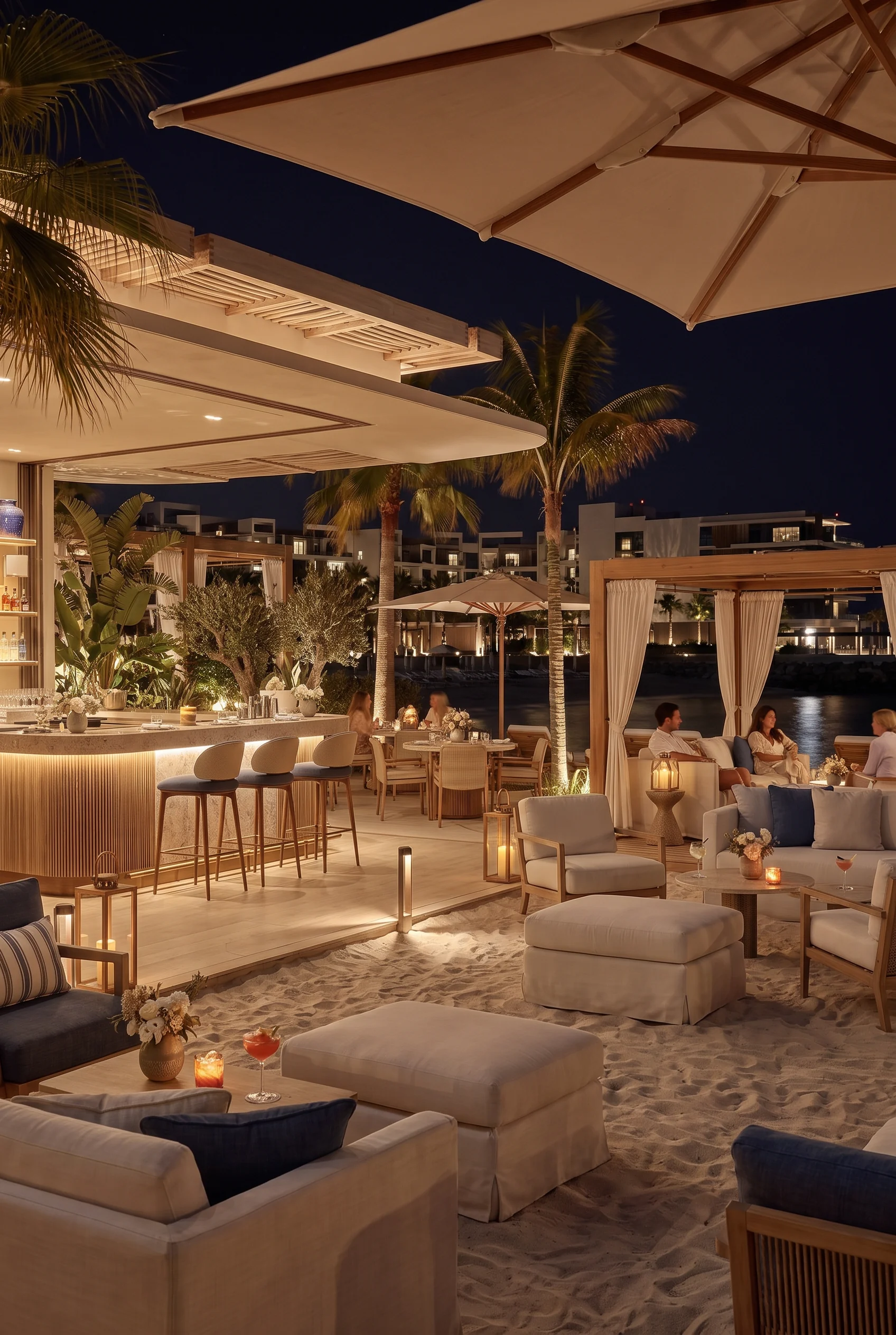 Portrait render of a resort beach bar at night with umbrellas, lounge sofas and warm lights on the sand