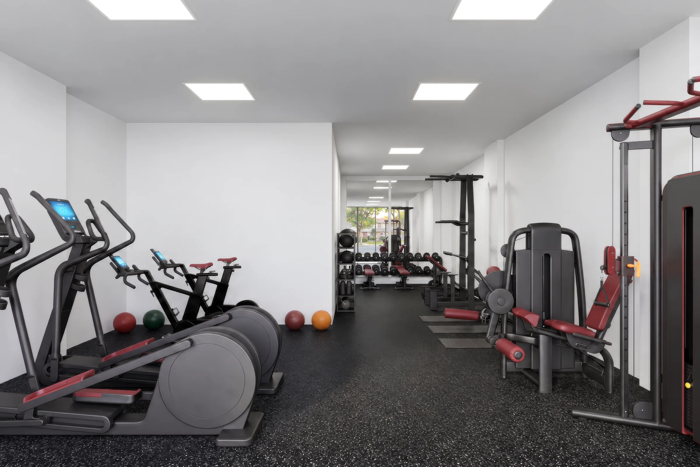 Visualisatie van gemeenschappelijke ruimtes voor een appartementencomplex met 300 woningen in Canada Render van een fitnessruimte in een appartementencomplex met krachtapparaten en een rij hometrainers voor ramen die uitkijken op een straat met bomen