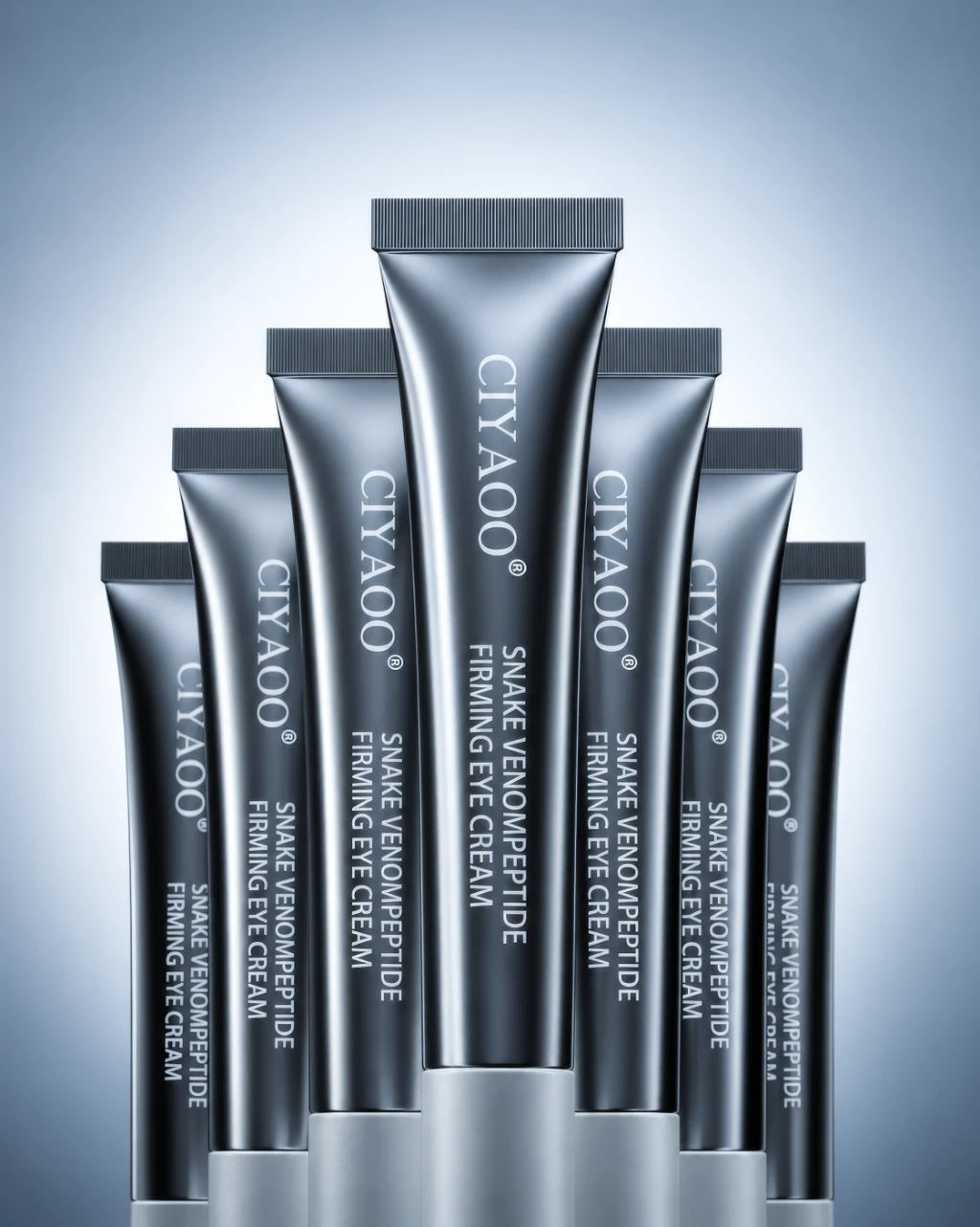 3D rendering of six black tubes of eye cream with silver caps on a gradient background.