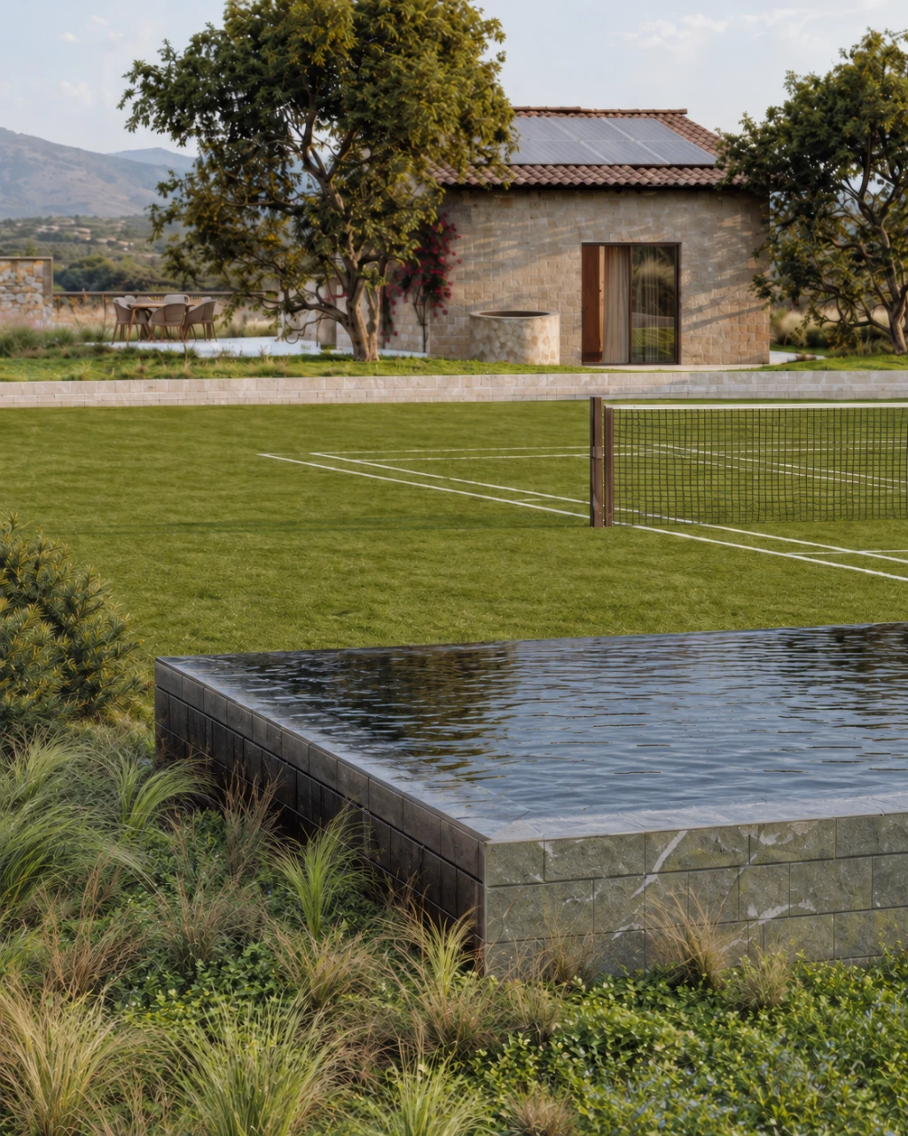 3D rendering of a serene outdoor space with a pool, tennis court, and stone house in background.