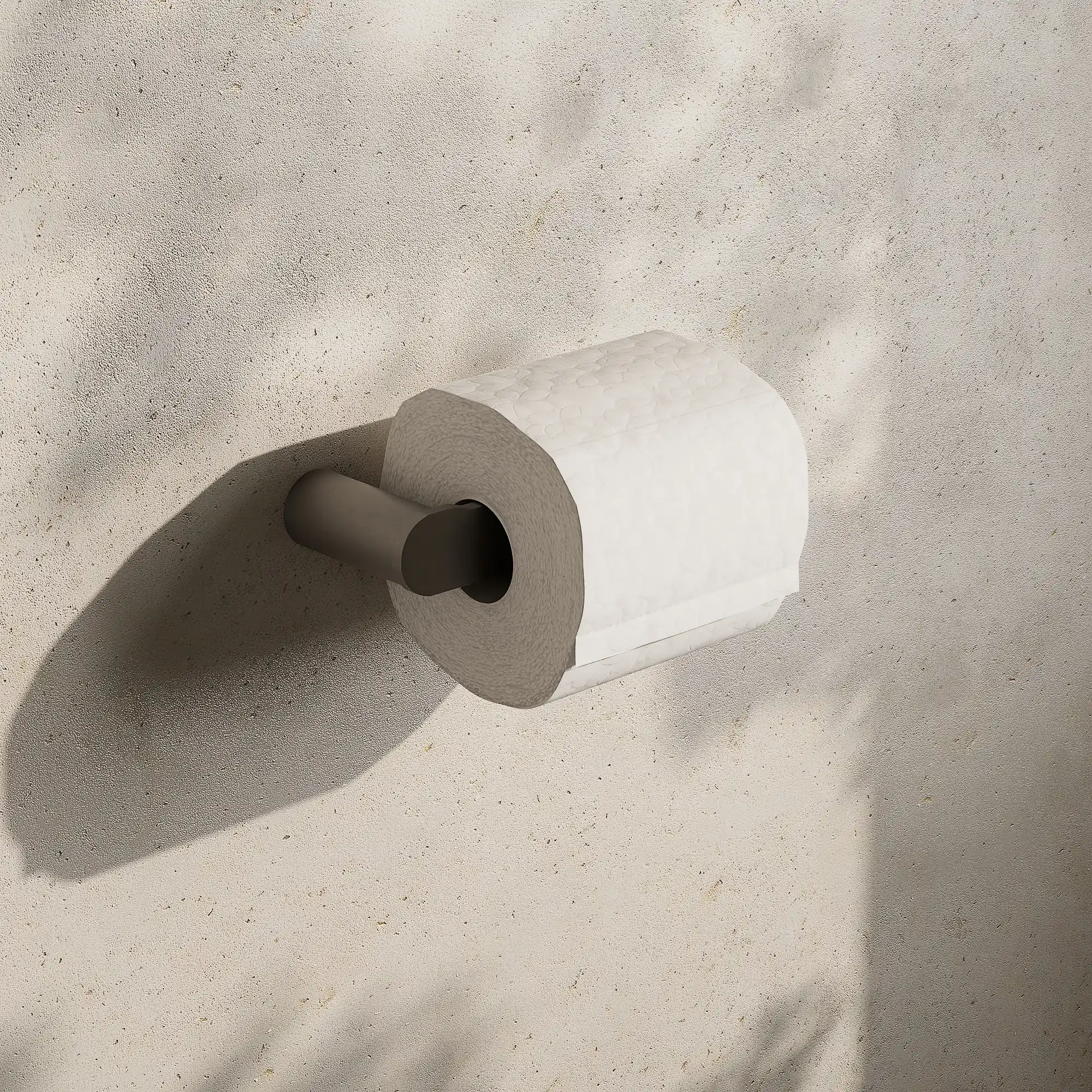 Render of a flat toilet roll holder in brushed stainless with a roll of paper on a stone wall