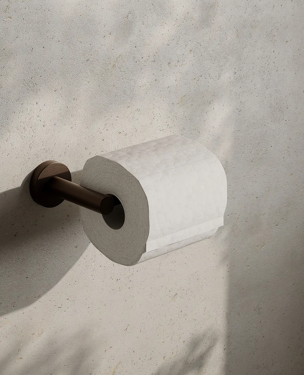 Render of a satin bronze toilet roll holder on a bathroom wall