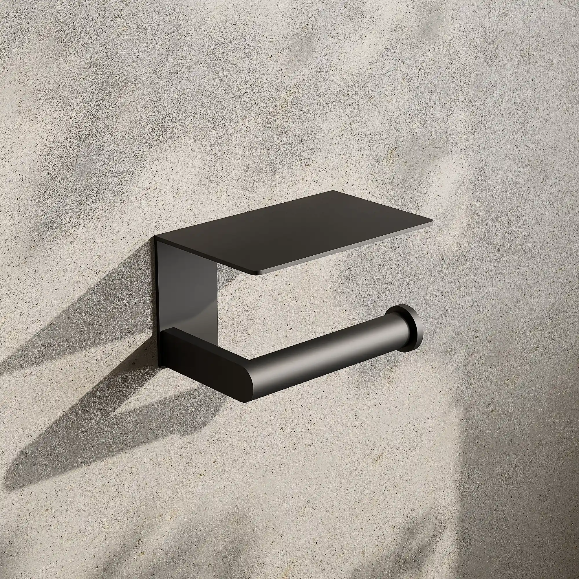 Render of a toilet roll holder with a shelf in gunmetal black on a stone wall