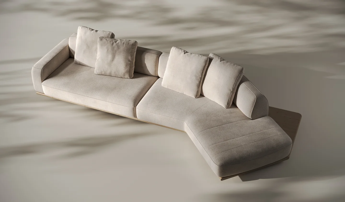 Top-down render of a curved modular sofa showing how its modules join and how the chaise turns the corner