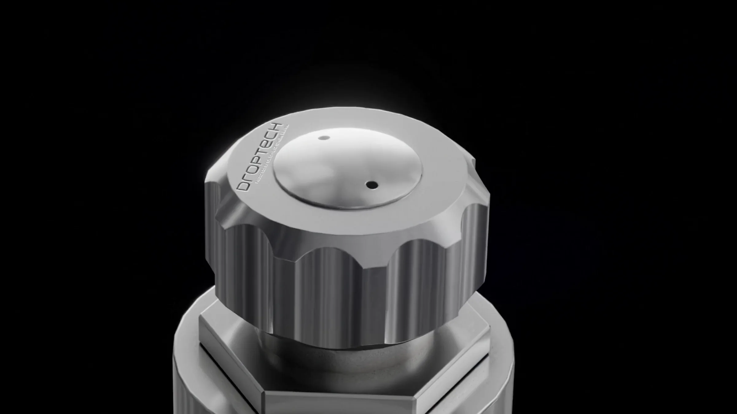 Close-up still of the knurled adjustment cap on top of the steel valve