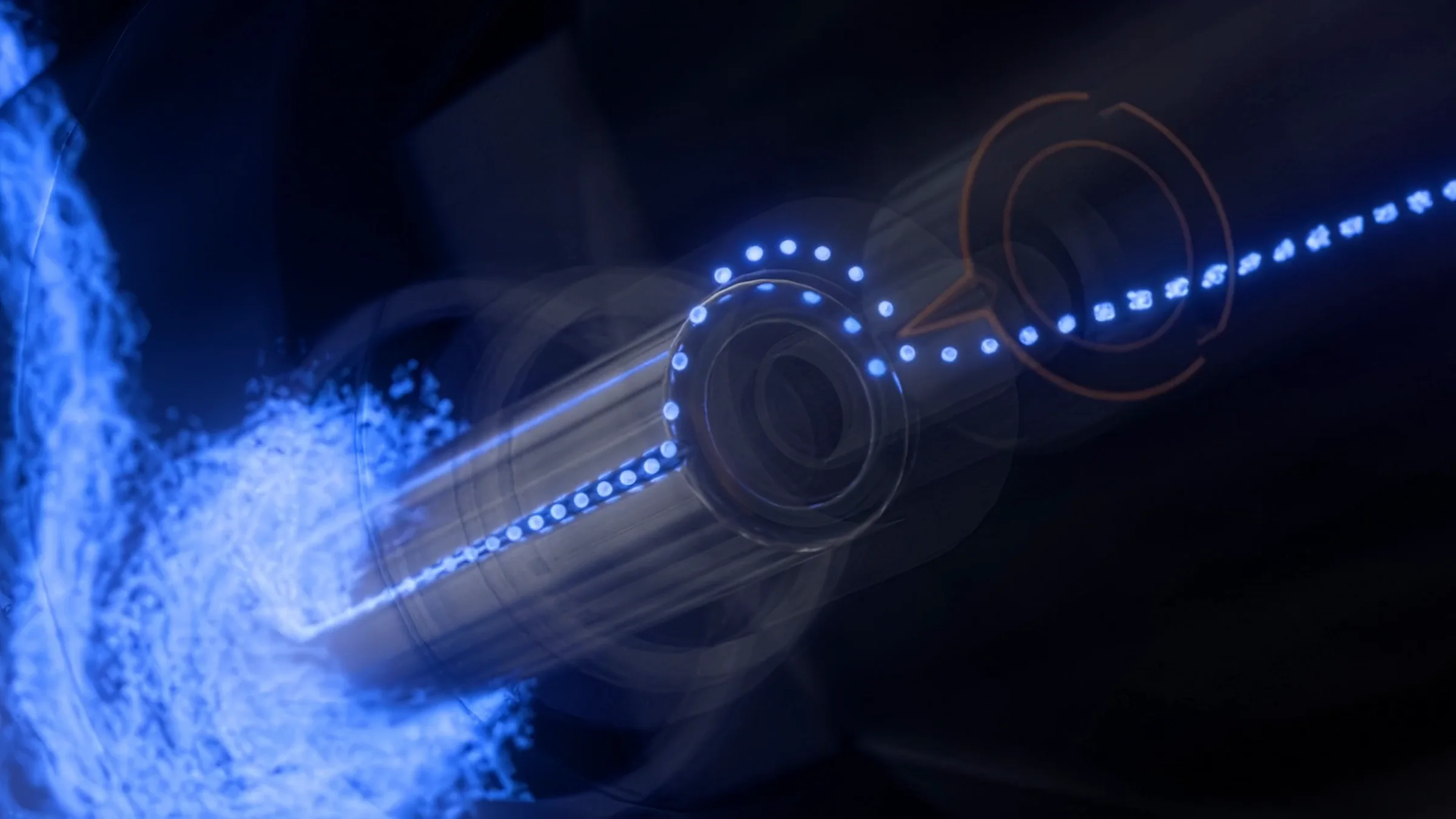 Still of the fluid path shown as a dotted line of droplets leaving the piston