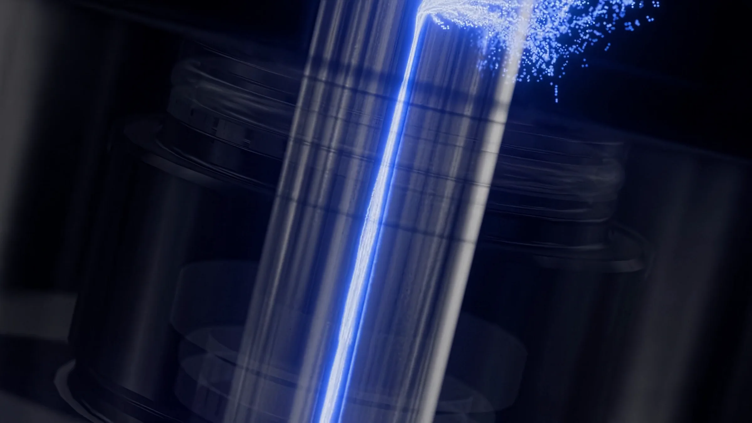 Still of blue fluid running down the channel inside the valve assembly