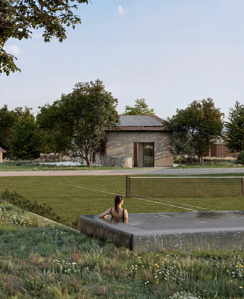 Render of a woman in a raised stone pool in front of a renovated stone house and grass tennis court on a Mallorca finca