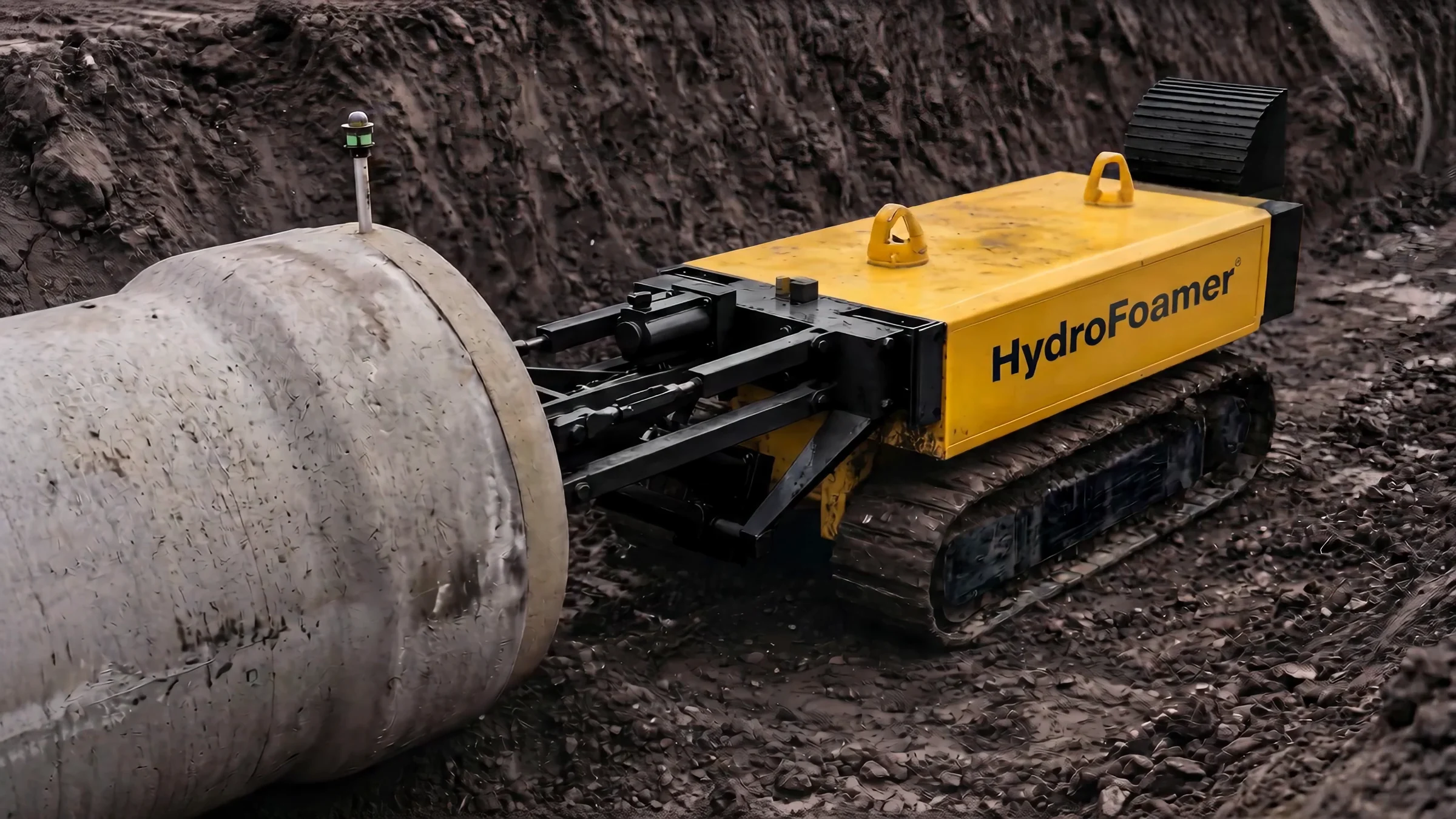 Pipeline Construction Animation for a Robotic Pipe Installation System Yellow track-based hydraulic unit pushing a pipe forward along the trench bed