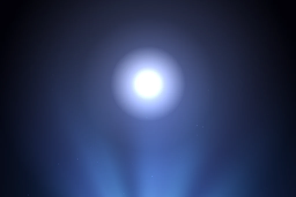 Launch film opener frame: a particle sphere collapsing into a burst of white light