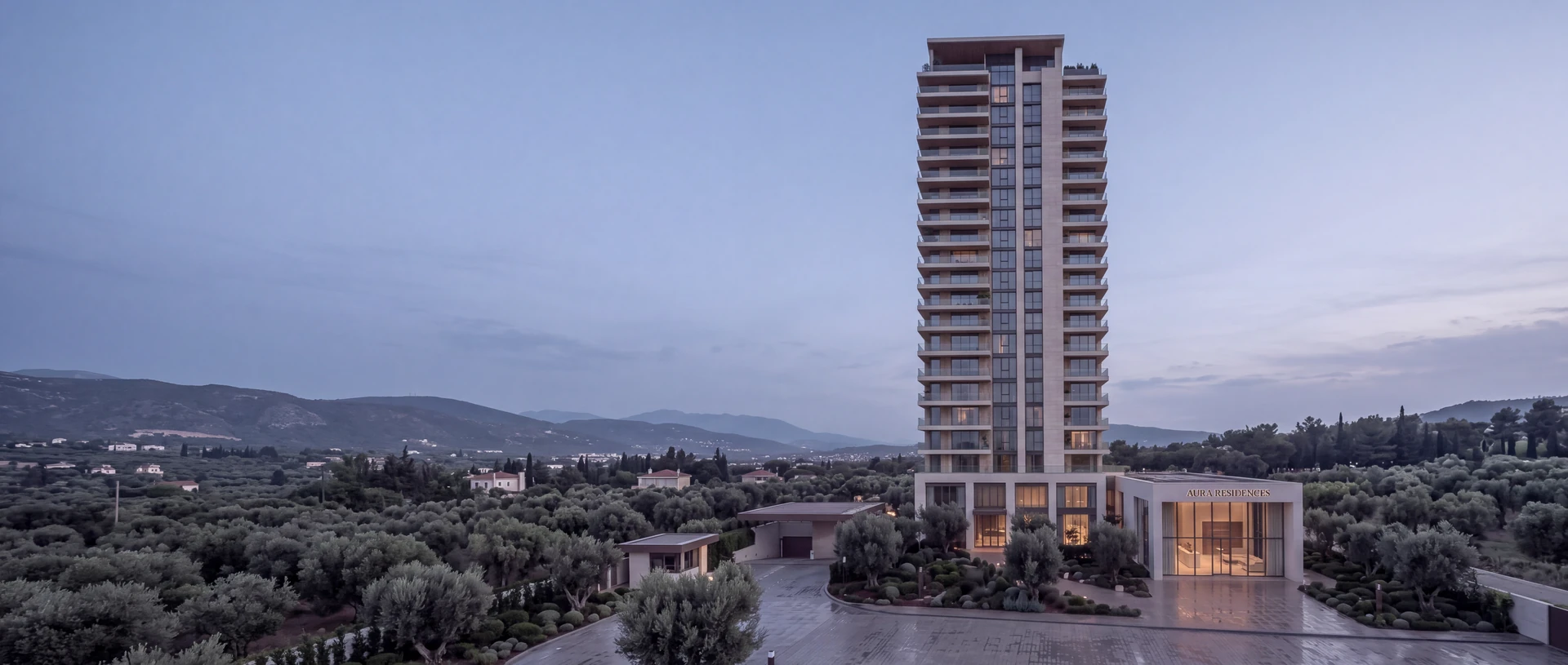 Render of a residential tower at dusk above olive groves with lit windows and a glass sales pavilion at its base