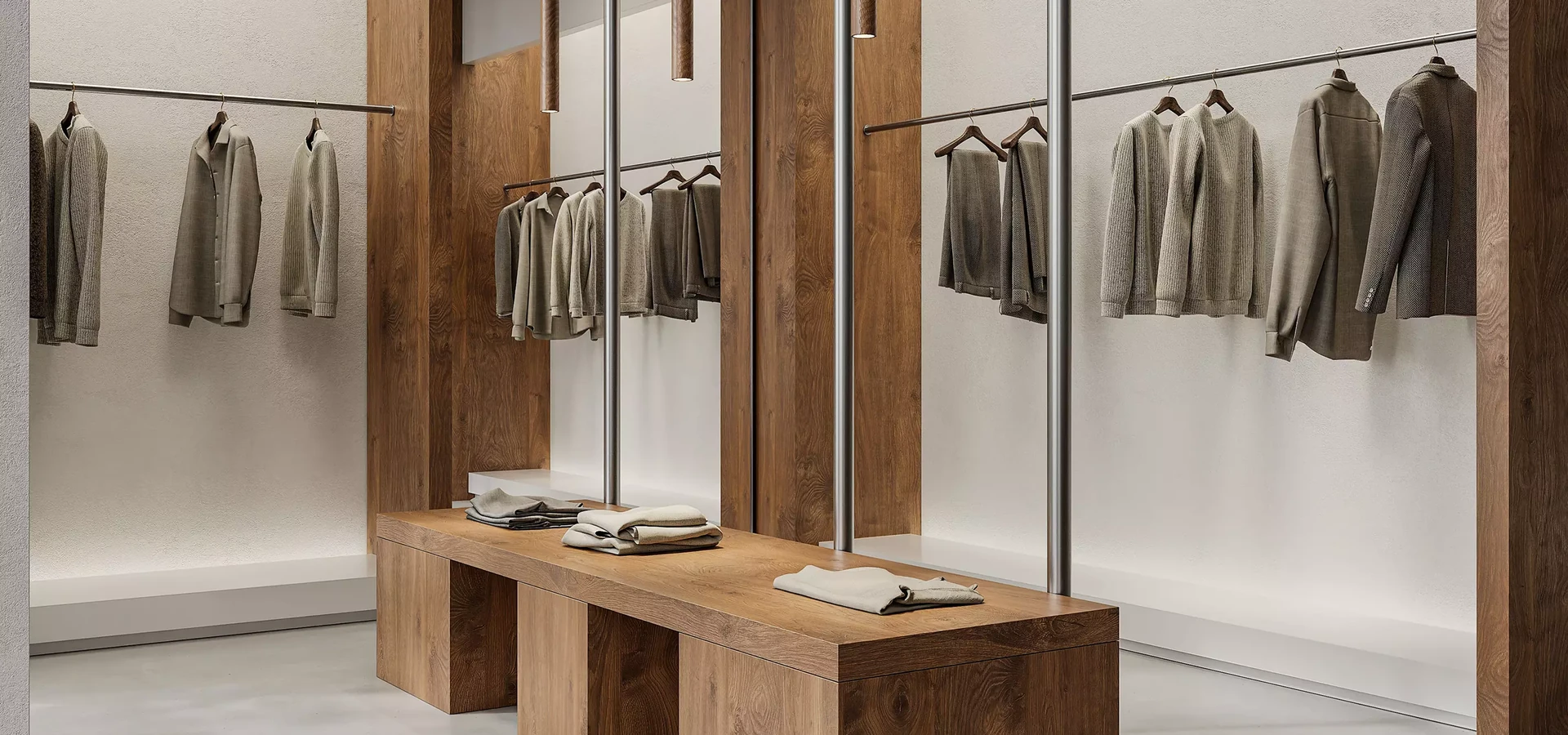 Render of a minimal clothing boutique with oak wall panels, garment rails and a long wooden bench