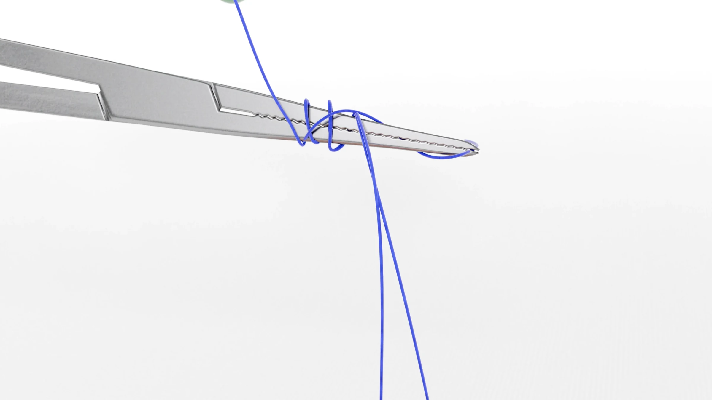 Needle driver tilts as the suture loops start to slide off its jaws