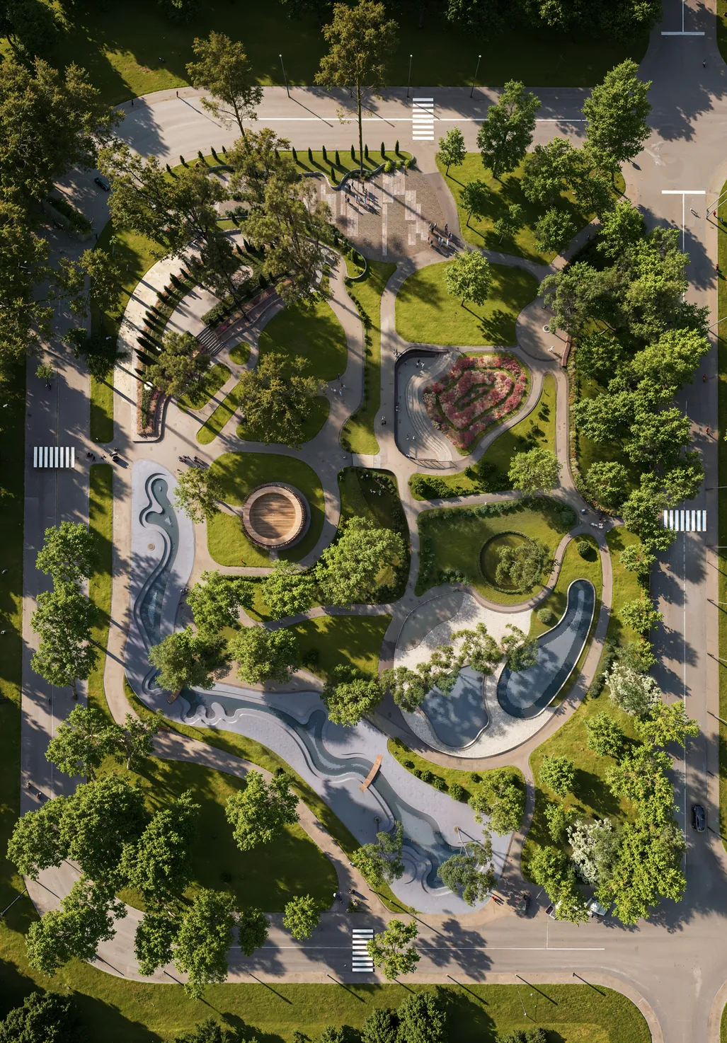 Draufsicht-Rendering eines Parks mit Wasserlauf, Spiegelbecken, rundem Holzpavillon, Rasenflächen und Fußgängerüberwegen