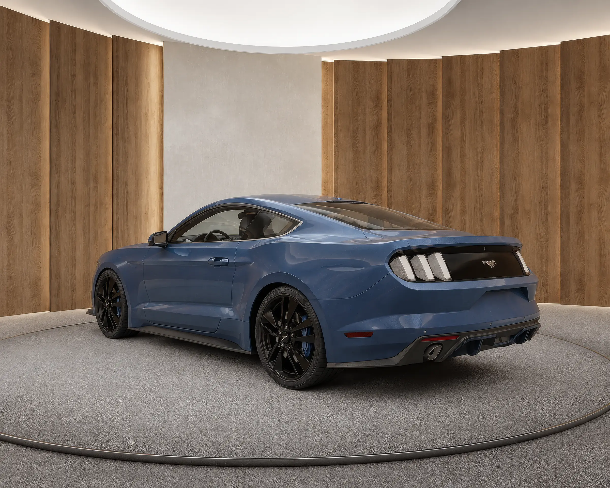 Rendering of a blue sports coupe from the rear three-quarter angle in a walnut panelled virtual car showroom with a round skylight and a grey platform