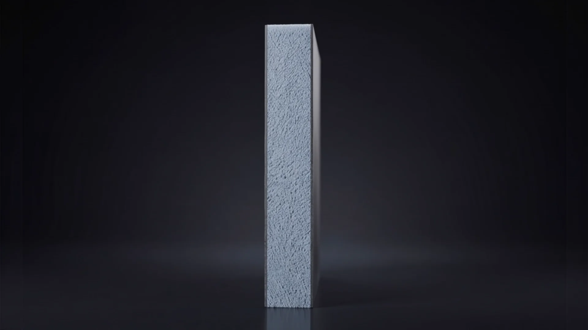 Exploded-View Wall System Animation for an Insulated Backer Board Still from the animation: a backer board seen side-on, showing its thickness on a dark stage